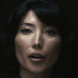 The generated dark-haired-side-eye animated emoji